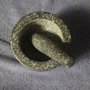 Mortar and pestle weight about 2 to 3 lbs.